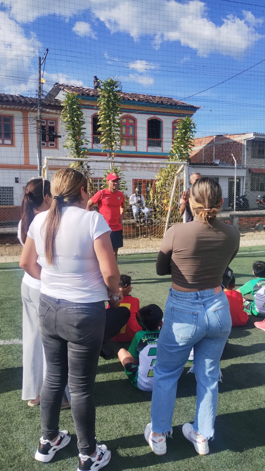 Children, families, and coaches take part in the Semillas Verdes sports event